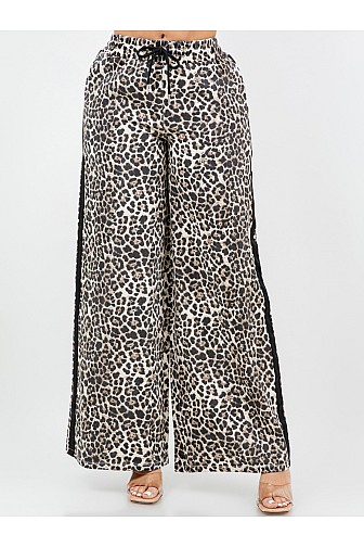 WIDE LEG ANIMAL PRINT PANTS WITH DRAWSTRING WAIST.
